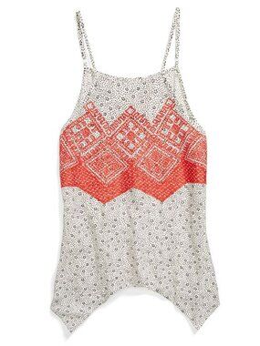 This garment is a tank top with red geometric embroidery and small polka dot pri